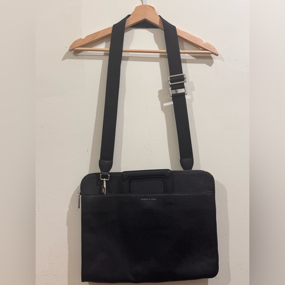 charles y keith Black Laptop Bag with Minimalist Design and Adjustable Strap